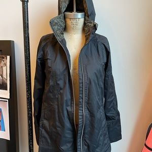 Lululemon raincoat.  Excellent condition black with camo printed liner.